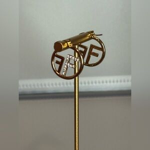 New Arrivals! Lux Fashion Gold and Rhinestone Logo Hoop Earrings.